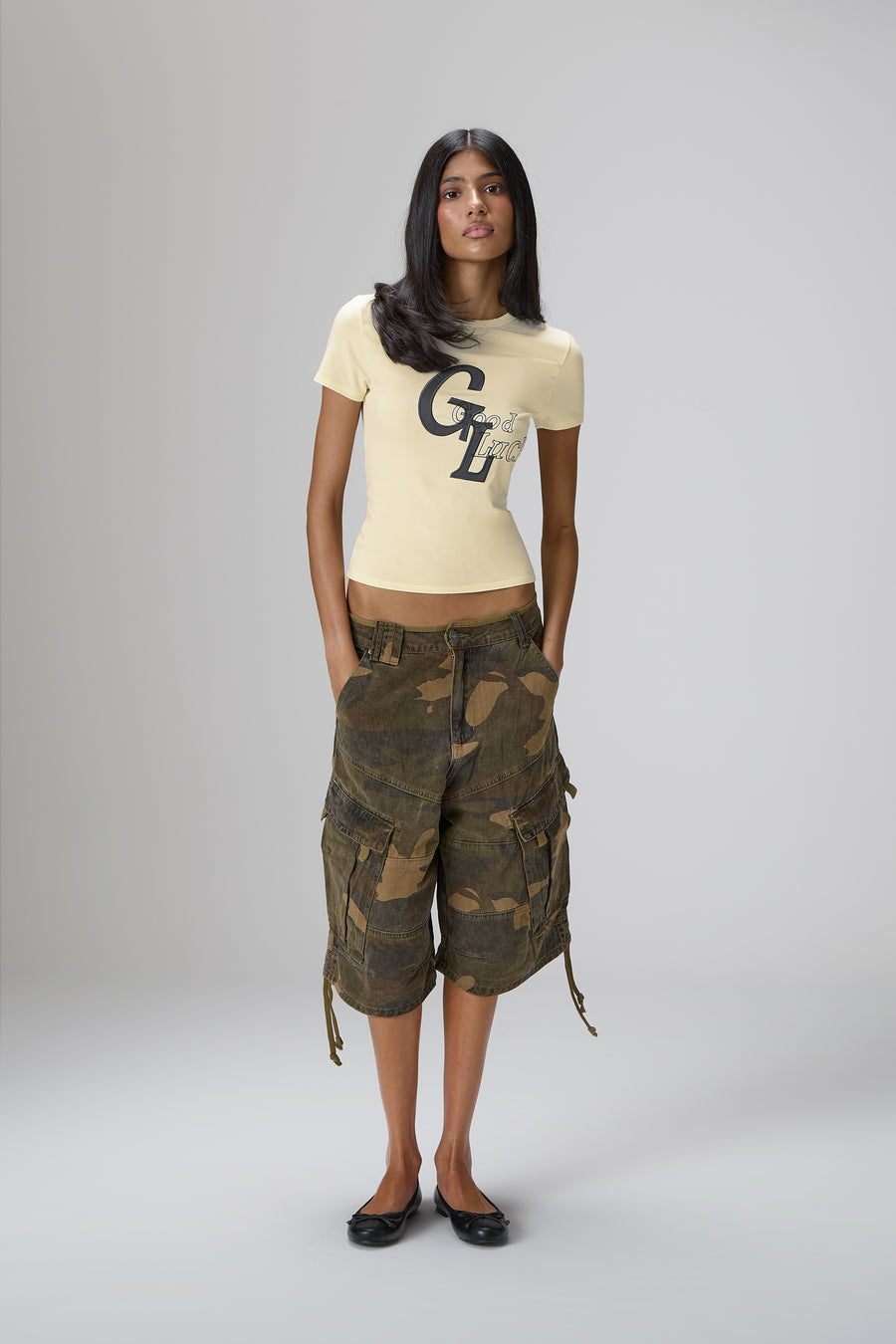 Good Luck Stretch Baby Tee in Yellow