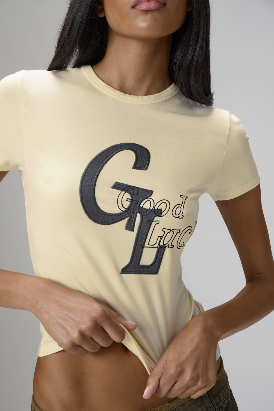 Good Luck Stretch Baby Tee in Yellow
