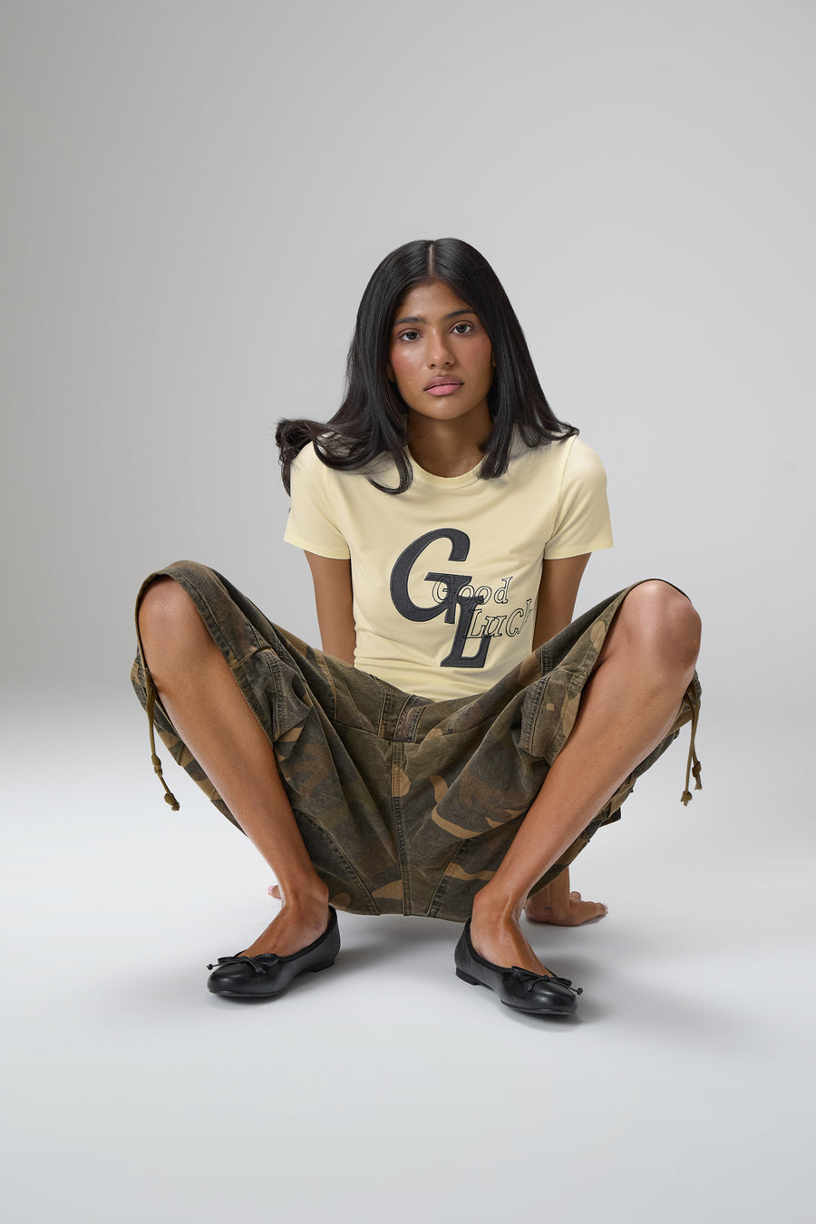 Good Luck Stretch Baby Tee in Yellow