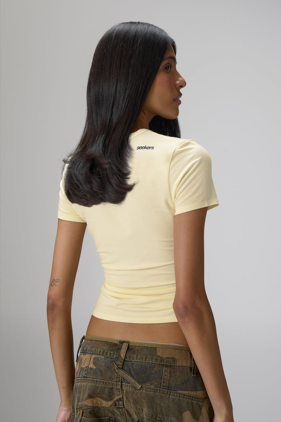 Good Luck Stretch Baby Tee in Yellow